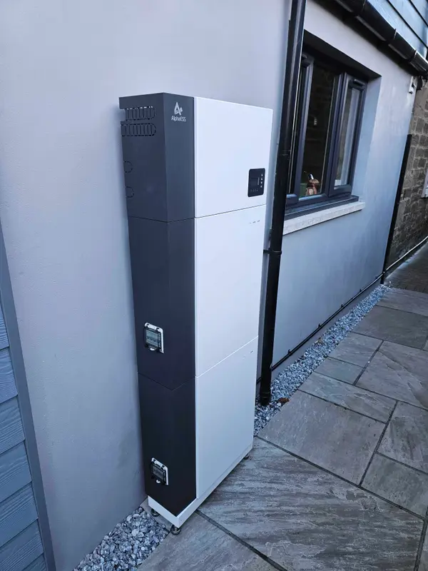 AlphaESS battery on a tidy patio corner