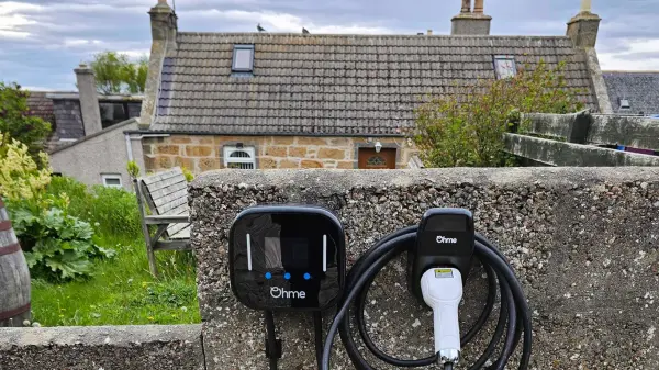 Charger and holstered cable at a stone cottage