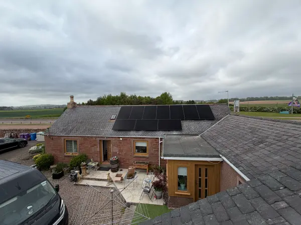 All-black array on a stone cottage