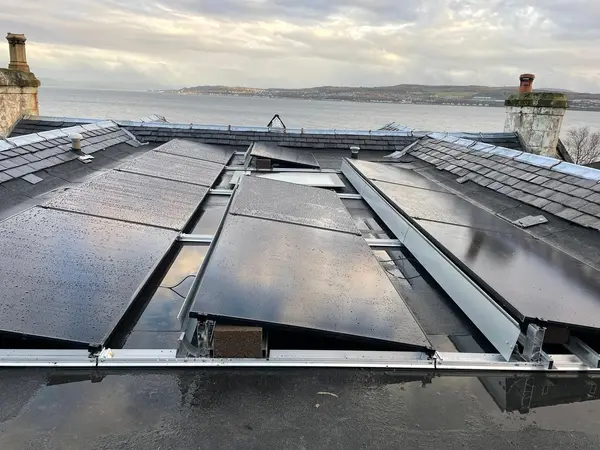 Low-pitch in-roof, sea view behind